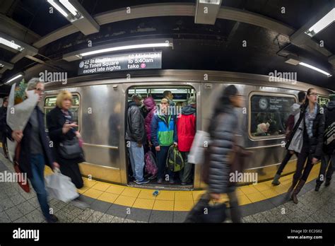 Passengers Crowd Into A Subway Train During Rush Hour In New York On Thursday November