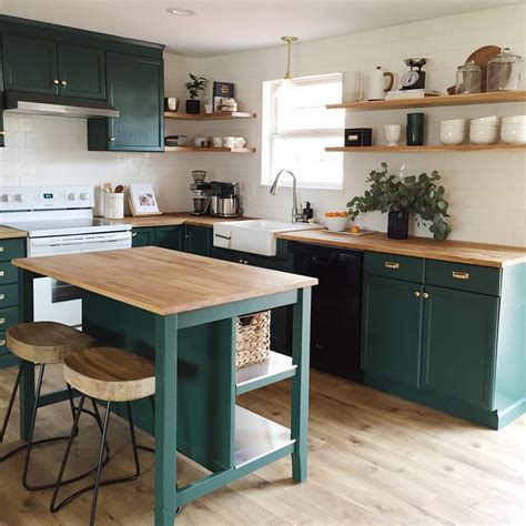 In the past, stained natural wood cabinets dominated every kitchen. green kitchen cabinets - Interiors By Color (9 interior ...