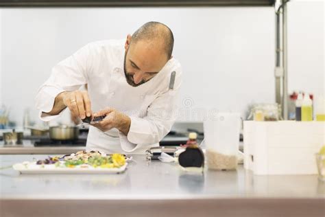 Male Professional Chef Cooking In A Kitchen Stock Image Image Of