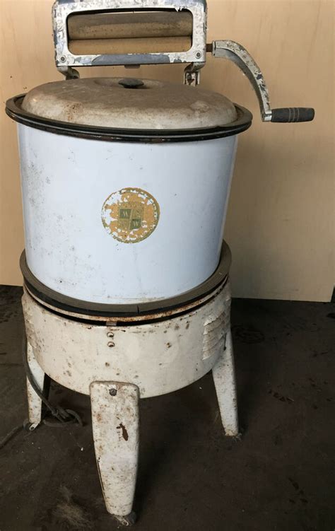 It doesn't hurt, it feels puffy and uncomfortable like water. VINTAGE MINI WARDS ROLLAWAY WRINGER WASHER WASHING MACHINE ...