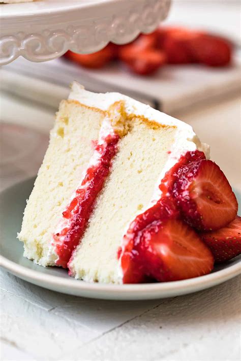 White Layer Cake With Whipped Cream Frosting And Strawberry Filling