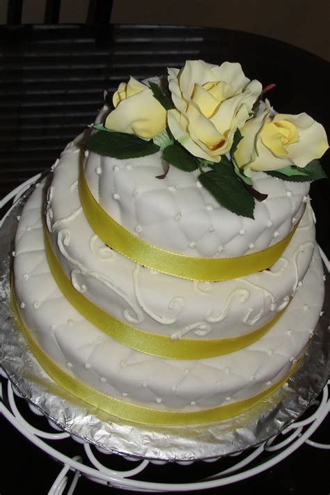 Edible all rose wedding cake with fountain stand. White Fondant Wedding Cake