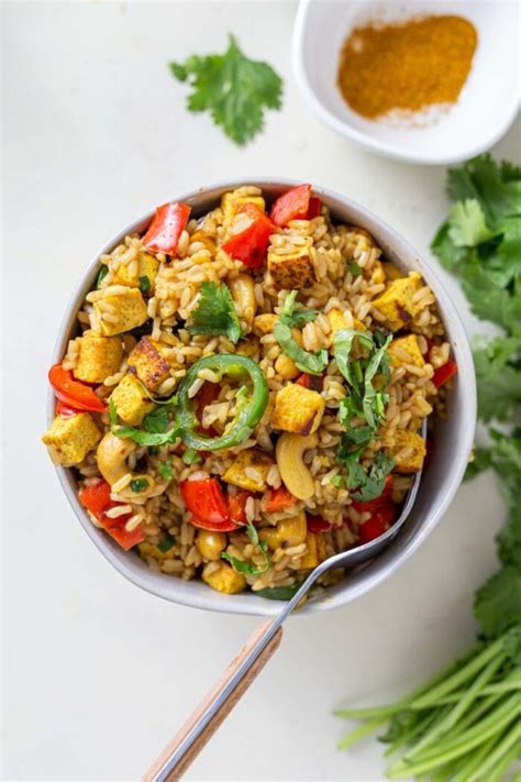 Simple preparations, exciting flavors and textures, and an inexpensive, healthy protein that's super versatile. Vegan Tofu Cashew Fried Rice Recipe - Running on Real Food