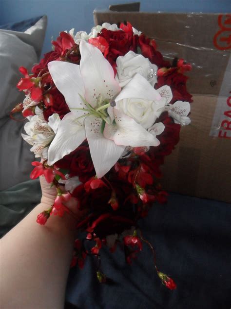 The cherry blossom theme lets you. Bouquet from silkblooms made with silk red cherry blossoms ...