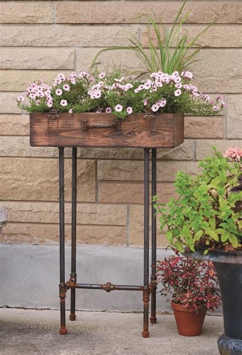 How To Make An Upcycled Suitcase Planter With Gas Pipe Legs Garden