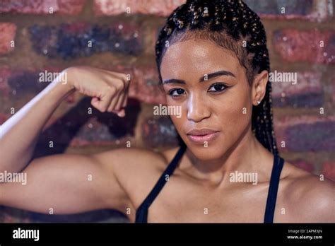 African Woman Flexing Biceps Hi Res Stock Photography And Images Alamy