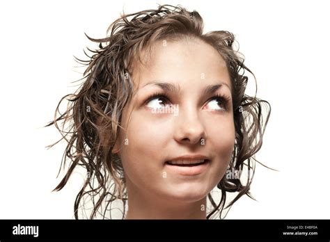Beautiful Girl With Wet Hair Looks Upwards Stock Photo Alamy