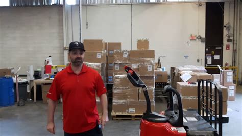 How do you use an electric pallet truck? How to use a Pallet Jack! - YouTube