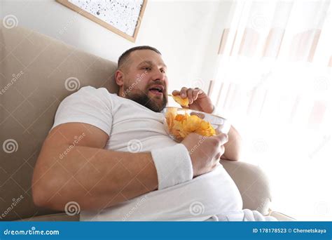 Lazy Overweight Man Eating Chips Stock Image Image Of Overweight Eating