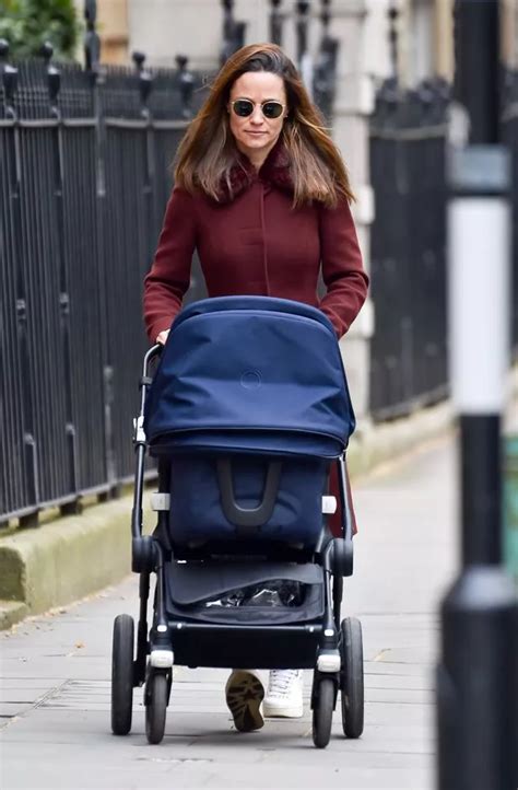 Pippa Middleton Stuns In Tight Fitting Burgundy Coat As She Enjoys Stroll With Newborn Daughter