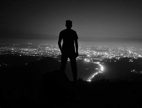 A Boy Enjoying Night View Of A City Pixahive