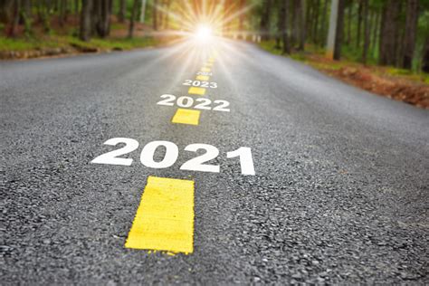 New Year Journey 2021 To 2024 On Asphalt Road Surface With Marking