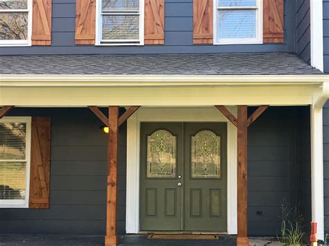 Transform Your Home's Exterior with Stunning Blue Wood Shutters: Click