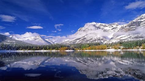 Download Wallpaper 1600x900 Mountains Lake Ripples Sky Clouds