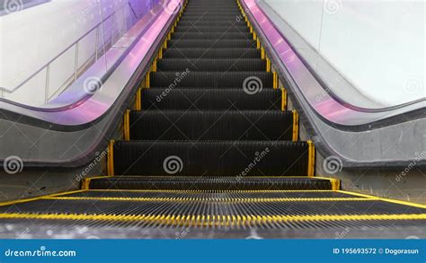Low Angle Looped Perspective View Of Modern Escalator Stairs Automated