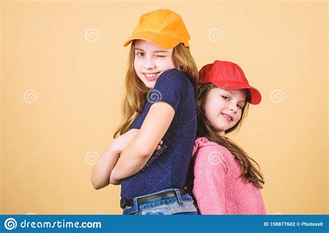 Cool Girls Sisters Stand Back To Back Beige Background Little Cute