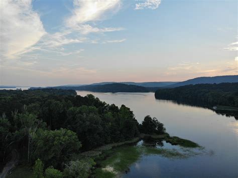 It is nestled in a small cove on beautiful guntersville lake, which has 949 miles of winding shoreline and 6900 acres of fun filled water. Lake Guntersville - Scottsboro - Alabama.Travel