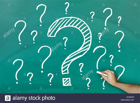 Hand writing lots of questions on green blackboard Stock Photo - Alamy