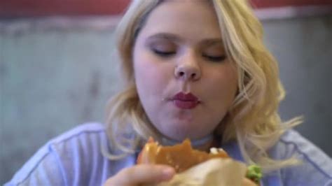 Fat Woman Eating Greasy Burger And French Fries Addiction To Fast Food Obesity Stock Video