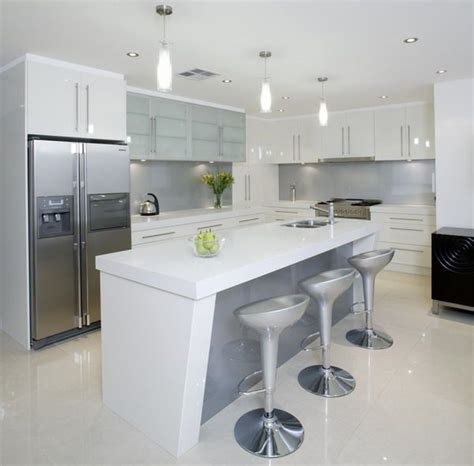 Maybe you would like to learn more about one of these? White kitchen with grey glass splash back - Like the ...