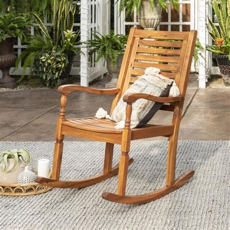 Walker Edison Brown Wood Rocking Chairs With Slat Seat In The Patio