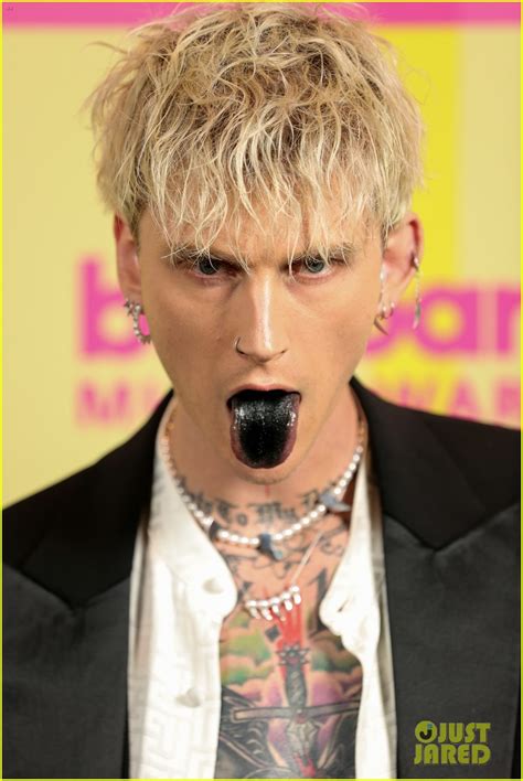 Machine gun kelly's performance in venice beach megan fox arrives at 2021 billboard music awards on may 23. Megan Fox Licks Machine Gun Kelly's Black Tongue at ...