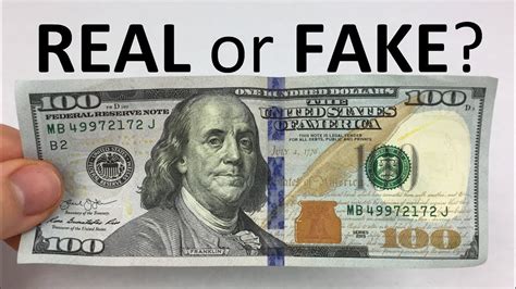 The image is visible from both sides of the note. How to Tell if a $100 Bill is REAL or FAKE - YouTube