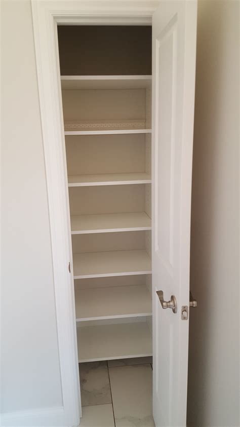 White Melamine Linen Closet With Adjustable Shelving Linen Closet