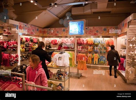 Children Shopping For Clothes In The Disney Store The Village