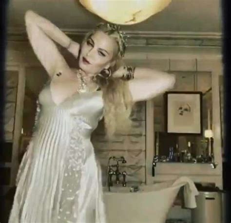 Madonna Exhibits Her Cleavage In Plunging Gown For Instagram Clip Fow