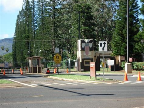 An Intersection With Construction Cones And Signs On The Side Of The