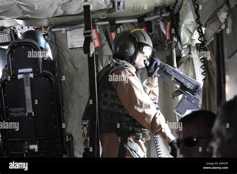 A So Called Doorgunner Observes The Surroundings During A Flight In A