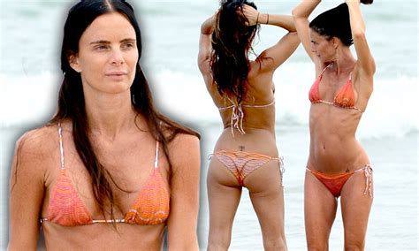 Burn Notice Actress Gabrielle Anwar Slips Into Skimpy Tangerine Bikini