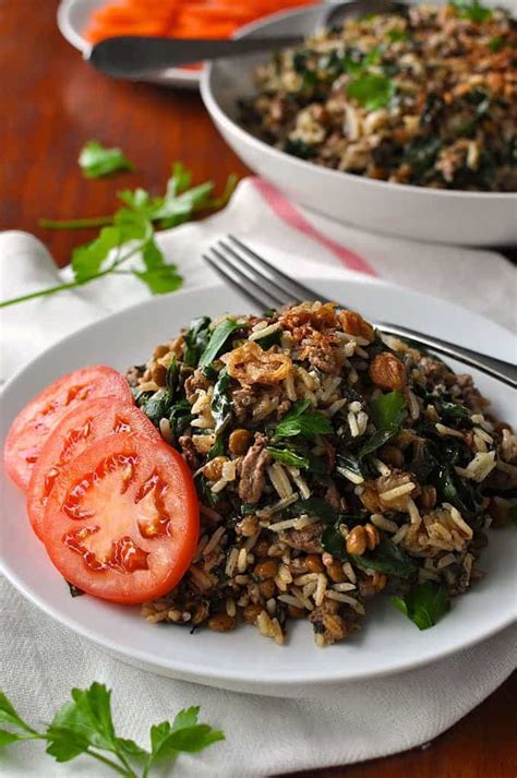 The nutty goodness of slowly browned onions, spices and sweet potato are offset by a burst of fresh cilantro in this chickpea and rice stew. Middle Eastern Lamb and Lentil Rice Pilaf | Recipe | Recipetin eats, Recipes, Middle eastern recipes