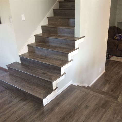 You'll have to cut spindle holes out of each tread and then cut each tread into two. Tap & Go Laminate flooring full stairs treads. | Laminate ...