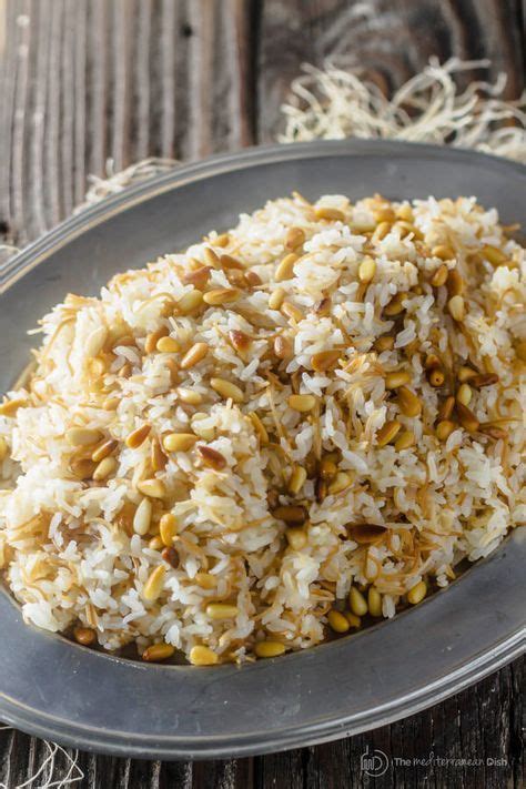 Basil cashew and raisins pilaf rice with basil, turmeric, peas, cashew and raisins. Lebanese Rice Recipe | The Mediterranean Dish. The perfect rice pilaf with olive oil, v ...
