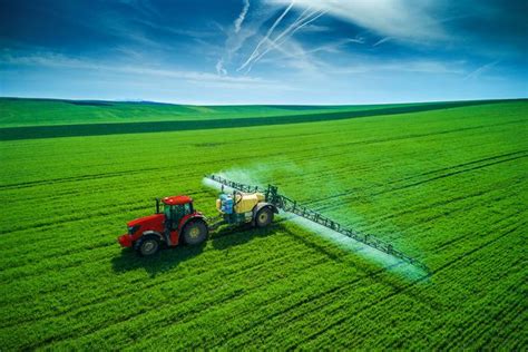 Tractor Spraying Crops Image Eurekalert Science News Releases