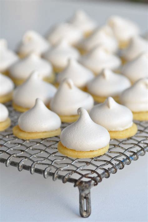 French meringue cookies are sweet, crisp, light and fluffy little clouds! eatable christmas gifts: austrian apricot jam meringue cookies. | Xmas food, Christmas food ...