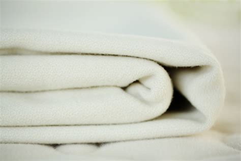 For my mattress, we have a firm savvy rest uses all natural rubber for their layers and organic cotton/wool covers. Natural Mattress Pad - Wool | Savvy Rest
