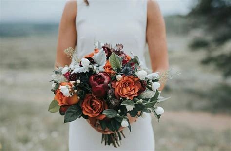 These fall inspired hues will help you set a warm. Burnt orange, burgundy, white, green and blue bridal ...
