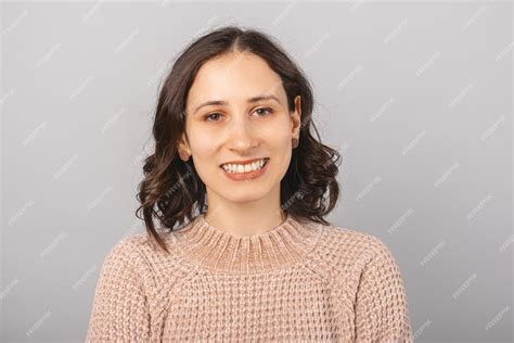 Premium Photo Portrait Of A Short Haired Girl Smiling At The Camera