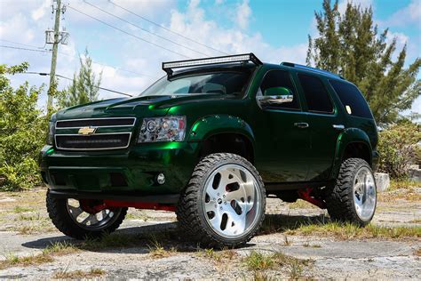 We'll get your dream vehicle to your door and exceed expectations. Lifted Chevy Taho Rides on Forgiatos, Looks Fresh in Green ...