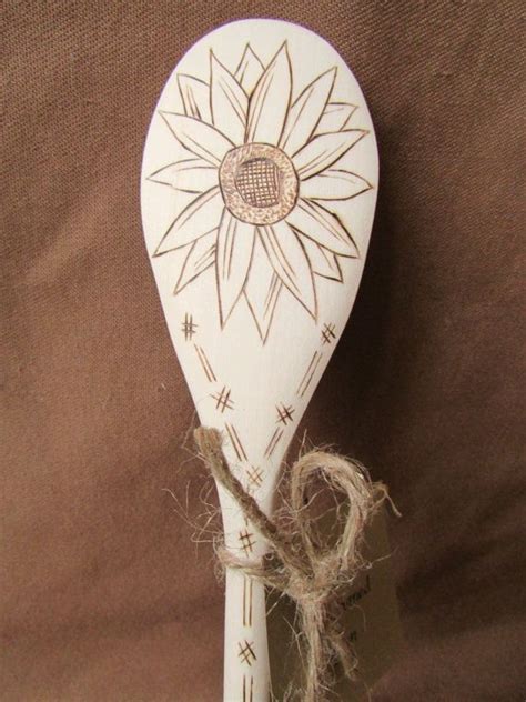 I use no templates or transfers, and each pendant is a little different. Sunflower Wood Burned Spoon by RedeemedDustDesigns on Etsy ...