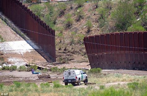 Border Officials Repair Garage Sized Hole Cut Into Arizona Mexico Fence