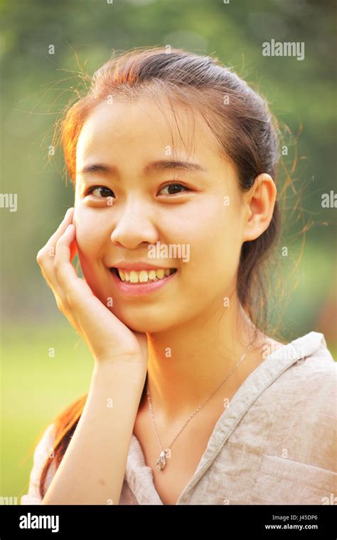 Portrait Of A Beautiful Asian Girl Morning Park Stock Photo Alamy