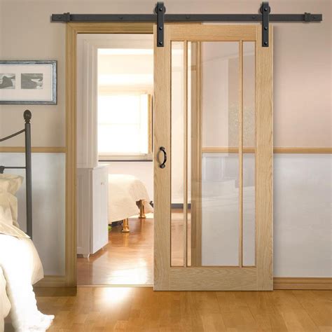 Single Sliding Door And Black Barn Track Lincoln 3 Pane Oak Door