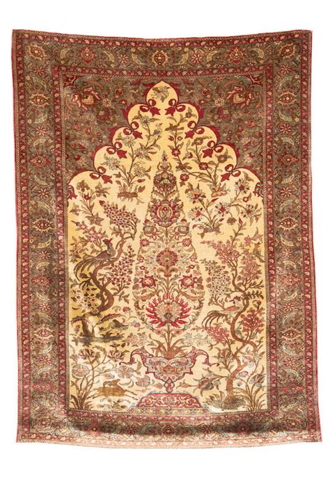bonhams a ghom silk rug central persia circa 1940 6 ft 10 in x 5 ft 209 x 153 cm very