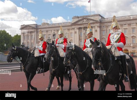 Mounted Royal Household Cavalry At Buckingham Palace In London Stock