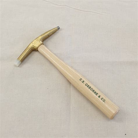 Berry staple remover with a wooden handle. Tools - Staple Remover Berry's - Upholstery Skills Online