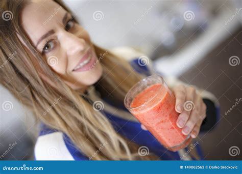 Attractive Girl In Sportswear Drinking Tasty Smoothie Stock Image Image Of Nutritious
